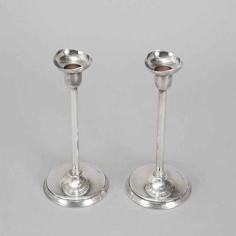 A pair of silver candlesticks from GAB, Stockholm, 1972.