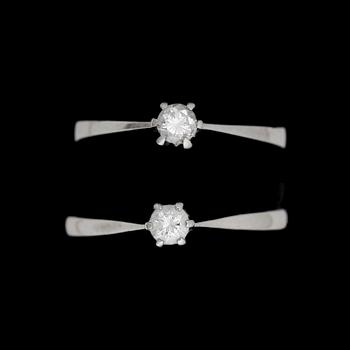 RINGAR, 2 st, 18k vitguld med briljantslipa diamant, respektive ca 0,15 ct. Total vikt 3,6g.