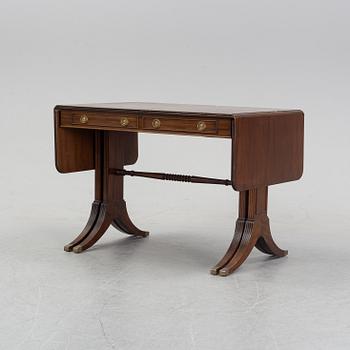 A mahogany dining table with folding and additional leaves, Nordiska Kompaniet, designed 1945.