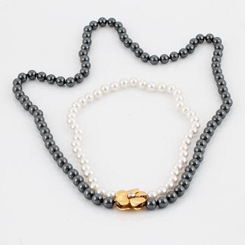 OLE LYNGGAARD, Charlotte Lynggaard, clasp with diamond, with threen necklaces included.