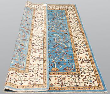A rug, Ziegler Design, ca 239 x 164 cm.