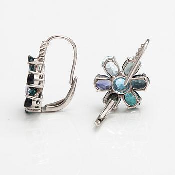 A pair of 14K white gold earrings with tpoazes, cordierites and tourmalines.