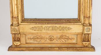 An Swedish Empire mirror, first half of the 19th century, attributed to Petter Gustaf Bylander, (Gothenburg 1802-59).
