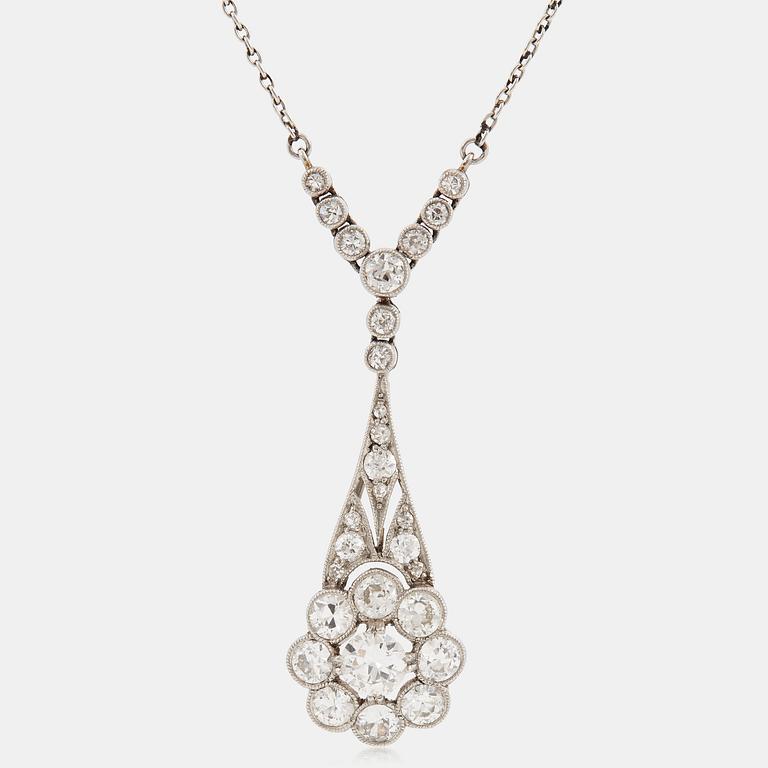 A platinum necklace set with old- and eight-cut diamonds.