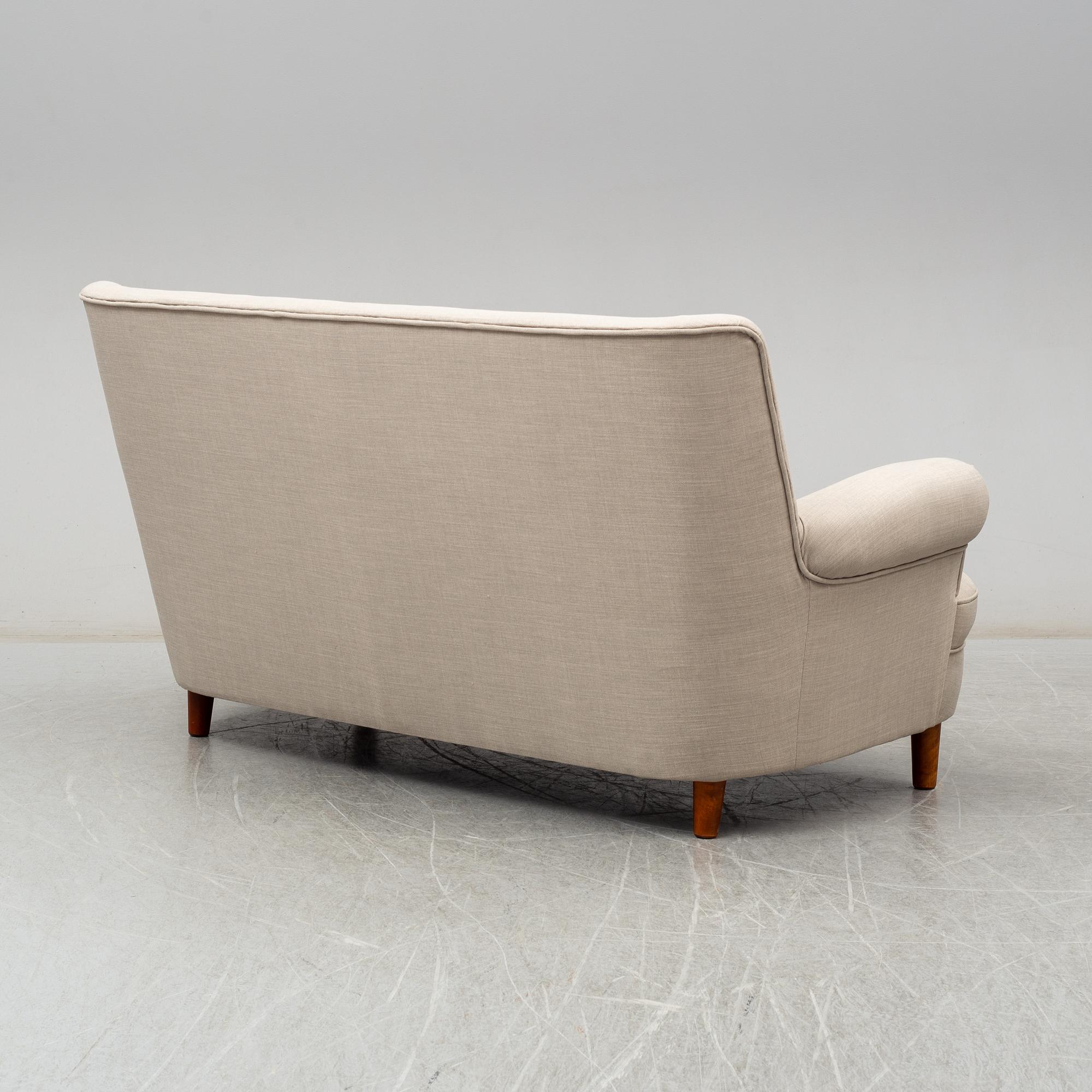 A 'Hemmakväll' sofa by Carl Malmsten.