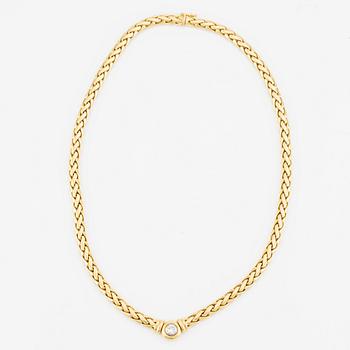 Collier/armband med en rund briljantslipad diamant ca 0.35 ct.