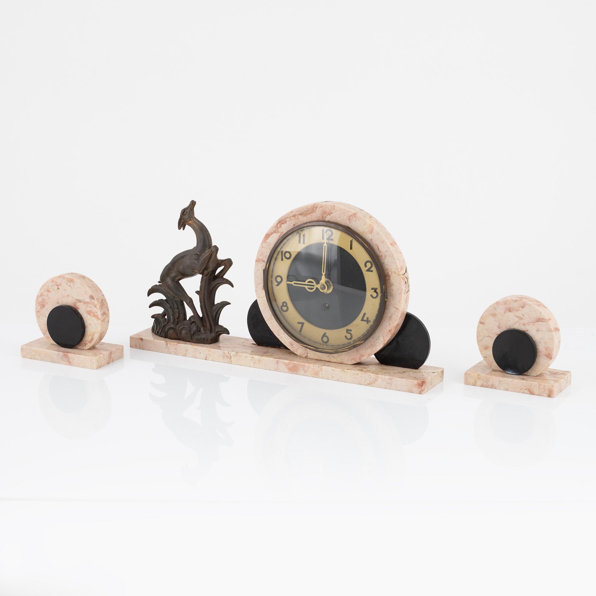 A 3-piece Art Deco mantel clock set, Ucra, France, 1930's.