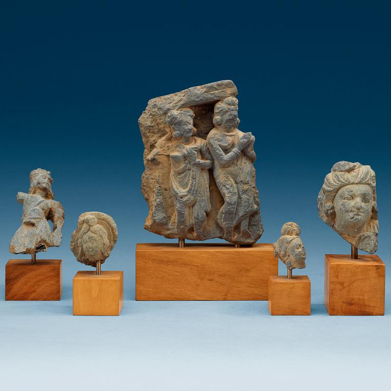 A group of schist Gandhara sculpture fragments.