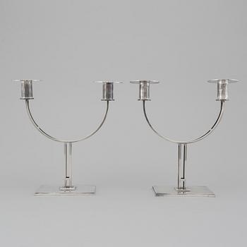 A pair of Klas-Göran Tinbäck two light sterling silver candelabra. Stockholm, 1989.