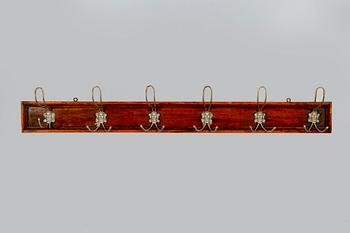 Hängare med krokar, 1900-talets början.