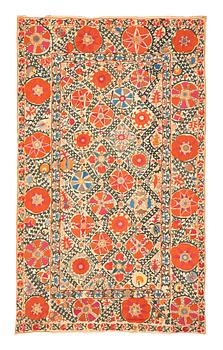 228. An embroidery, an antique suzani, ca 244 x 145 cm.