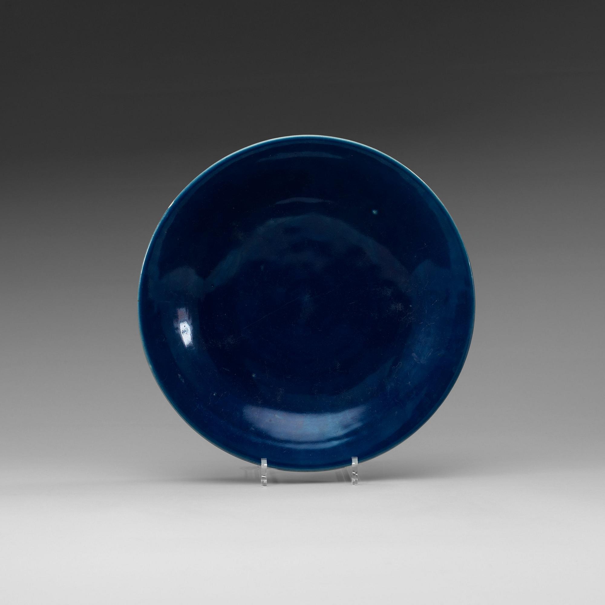 A blue glazed dish, Qing dynasty (1644-1912), with Qianlong seal mark.