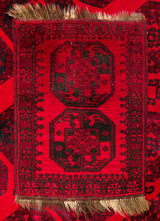 Two Afghan carpets. Ca. 326 x 217 and 88 x 63 cm.