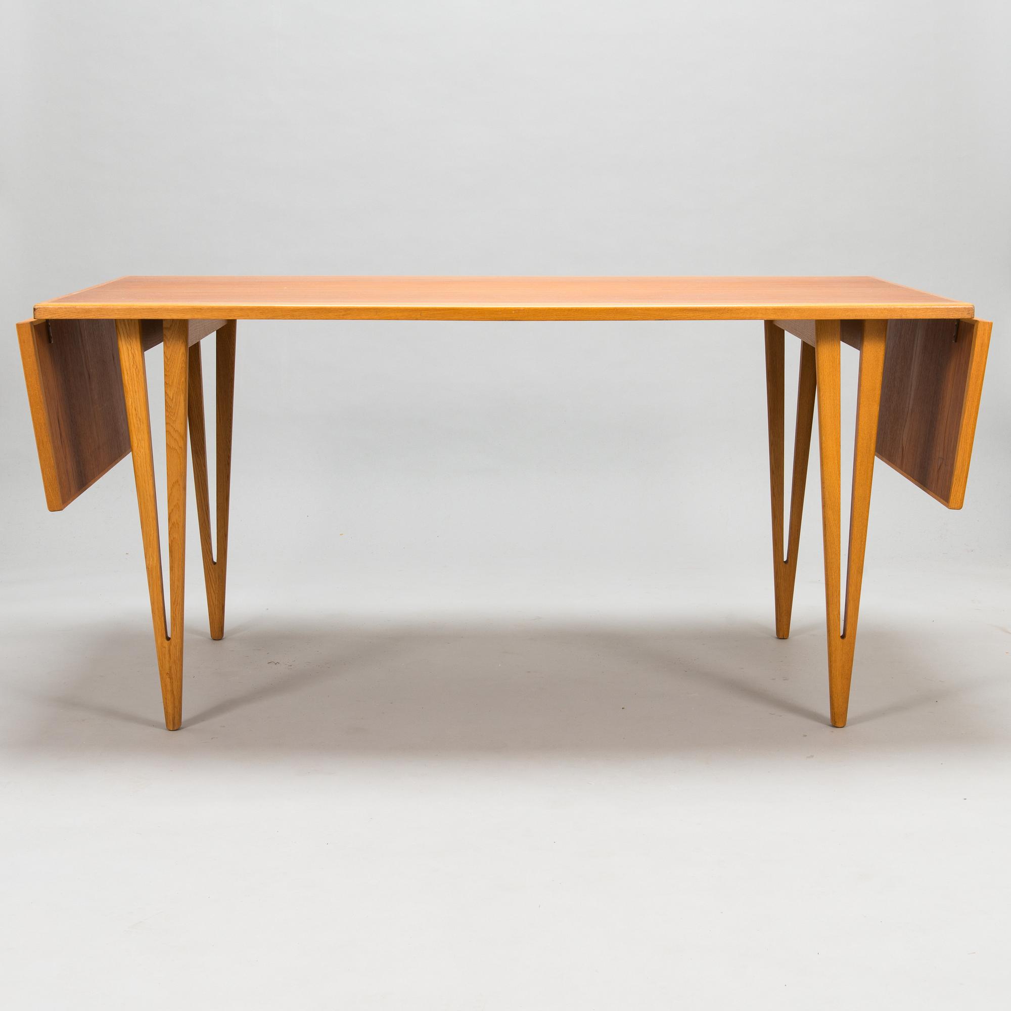 A mid-20th century dining table.