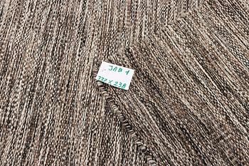 A flat weave carpet, c. 337 x 328 cm.