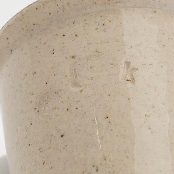 Kyllikki Salmenhaara, a stoneware tea strainer signed KS.