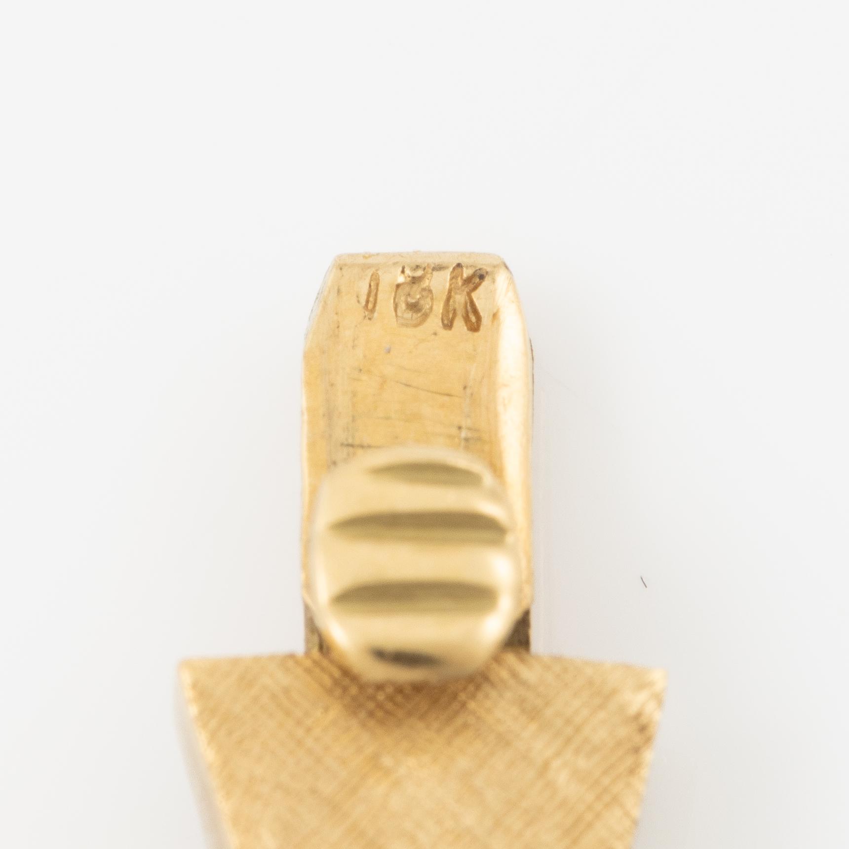 A necklace in 18K gold.
