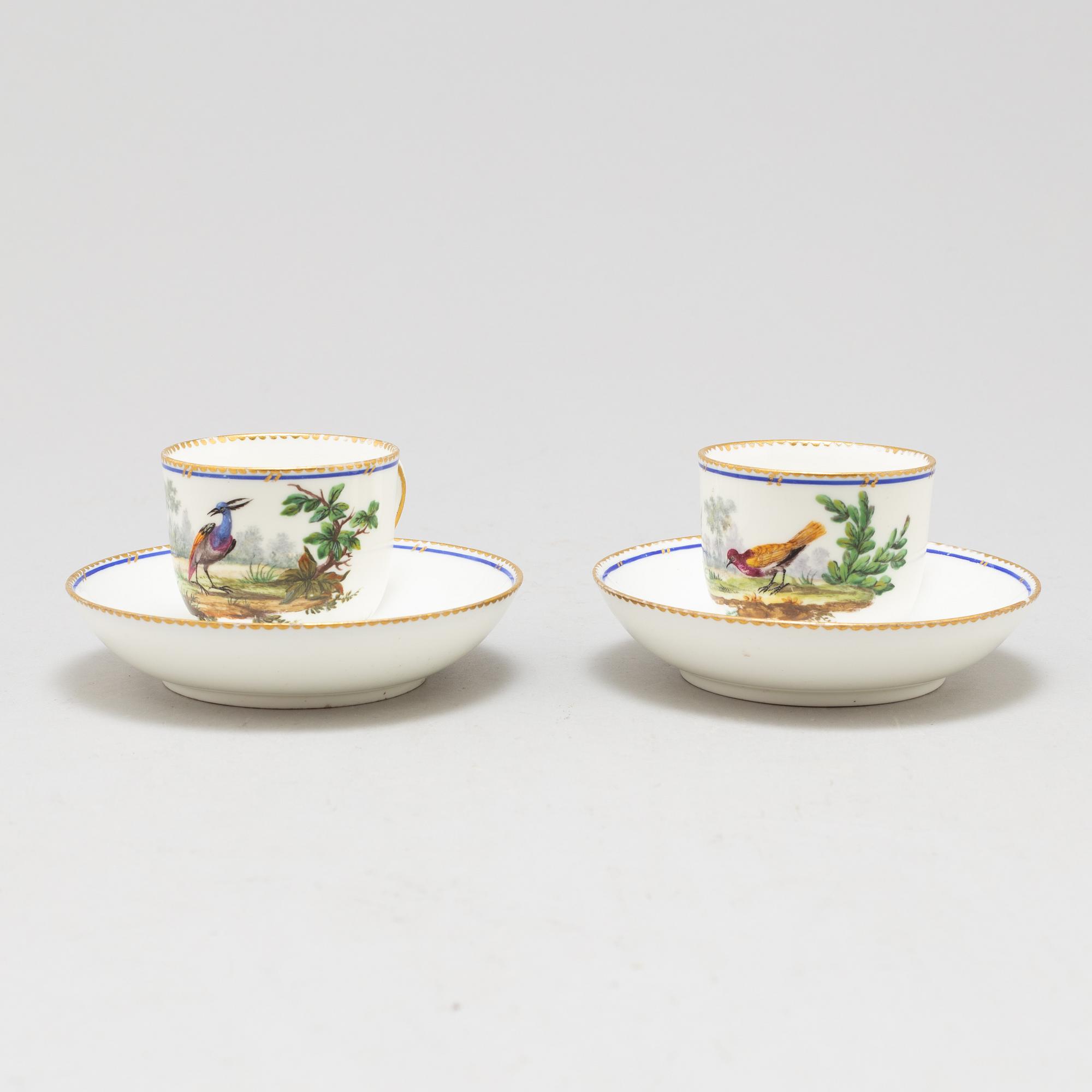 A pair of cups and saucers, "Sévrès"like mark, 19th century.