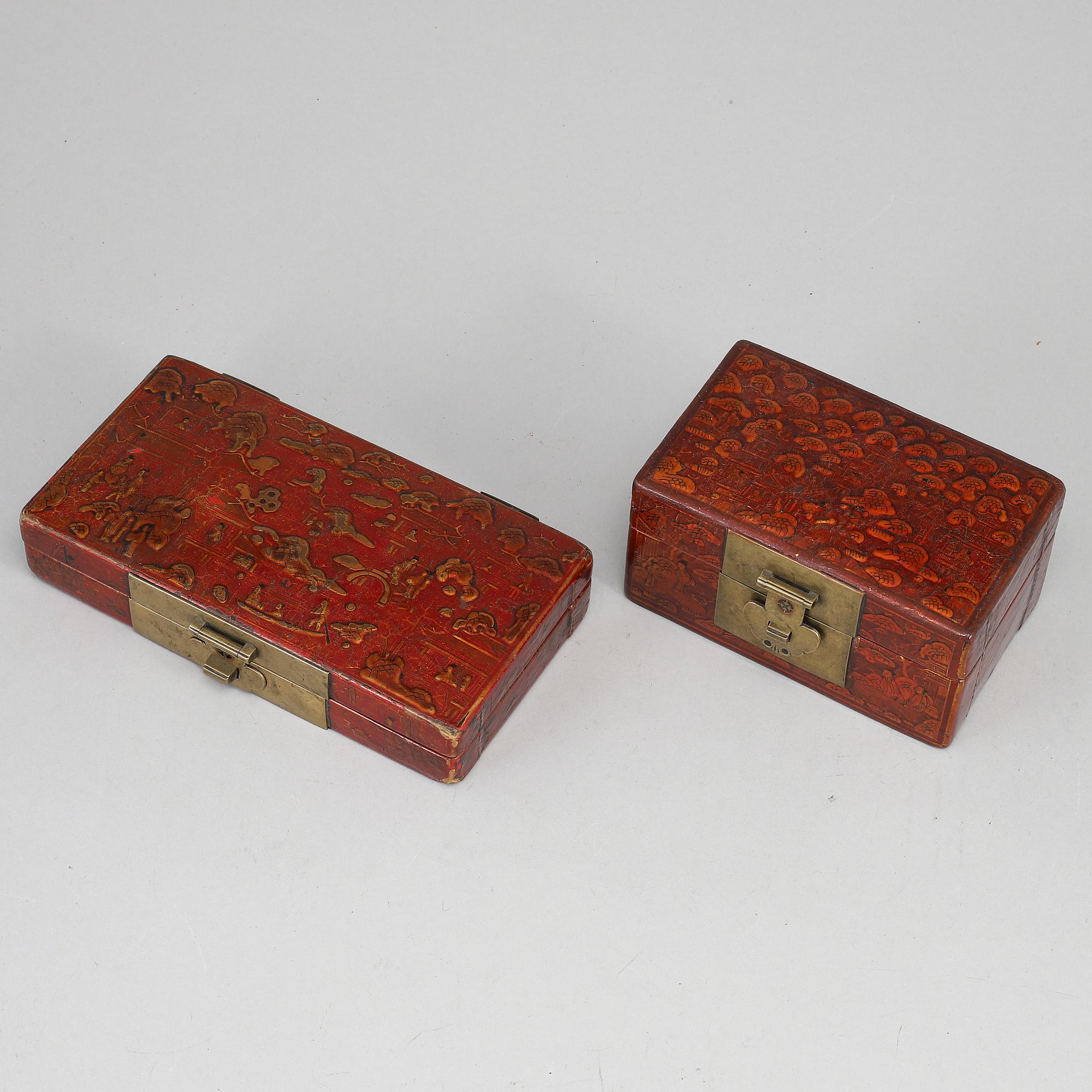 Two lacquered boxes with covers, circa 1900.
