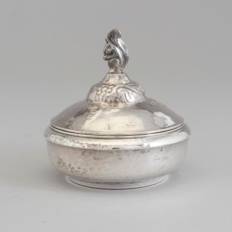 A Swedish Art Nouveau lidded silver box topped with a chipmunk, maker's mark Carl Sandberg, Ystad, 1919.