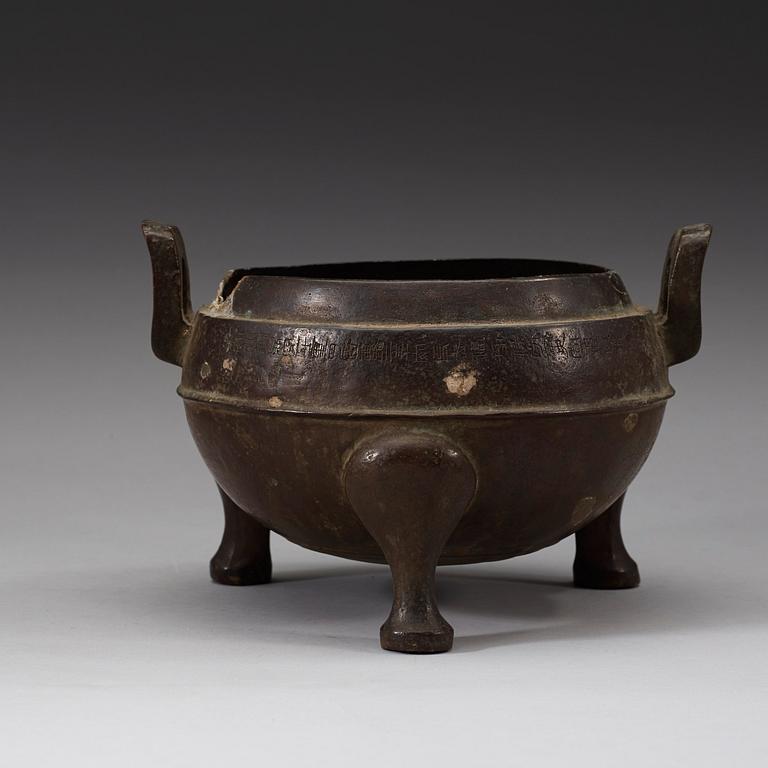 A bronze tripod censer, presumably Han dynasty (206 B.C-220 A.D).