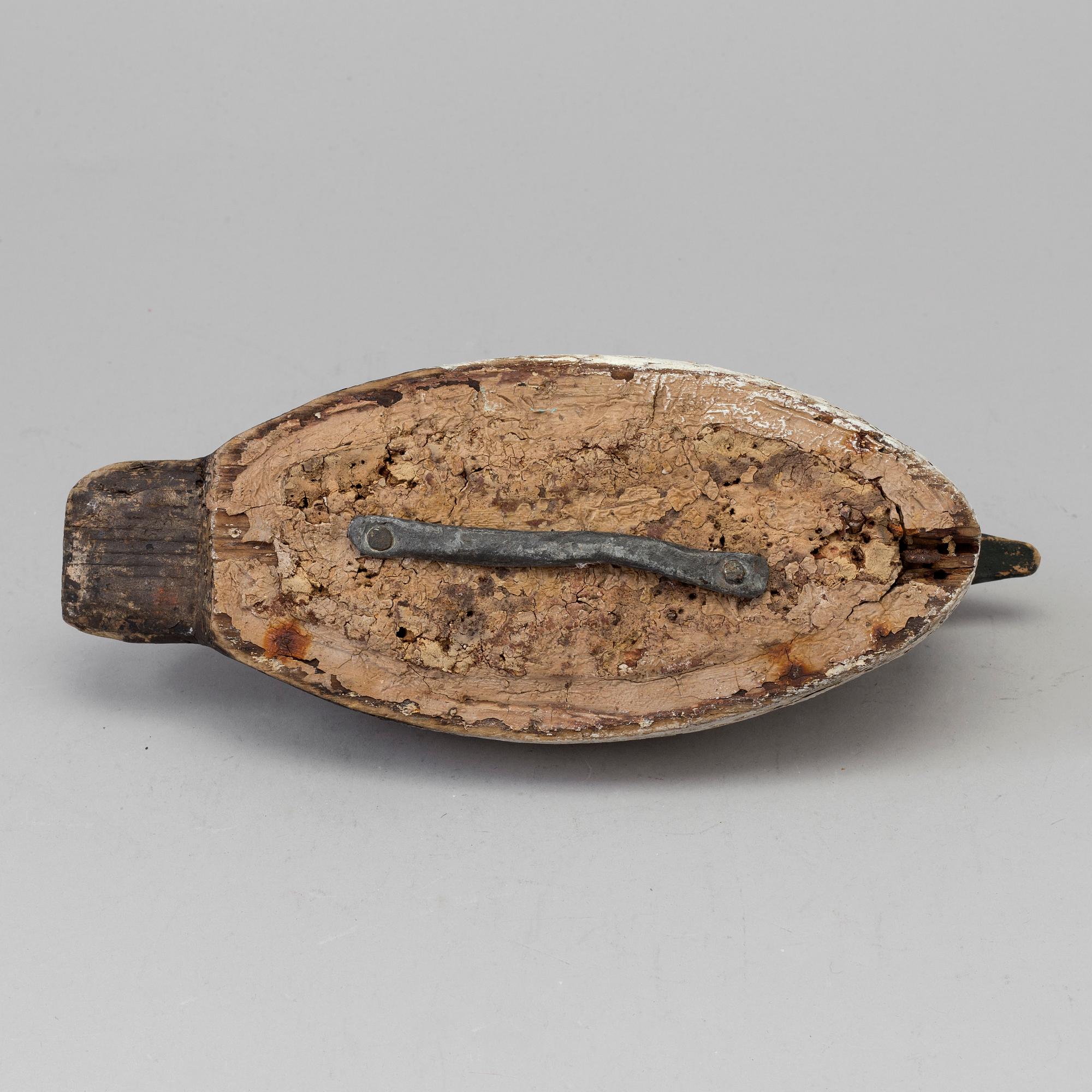 A duck hunt wood decoy circa 1900.