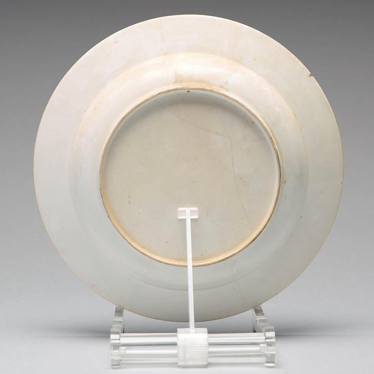 A set of eight blue and white armorial soup dishes, Qing dynasty, 18th Century.
