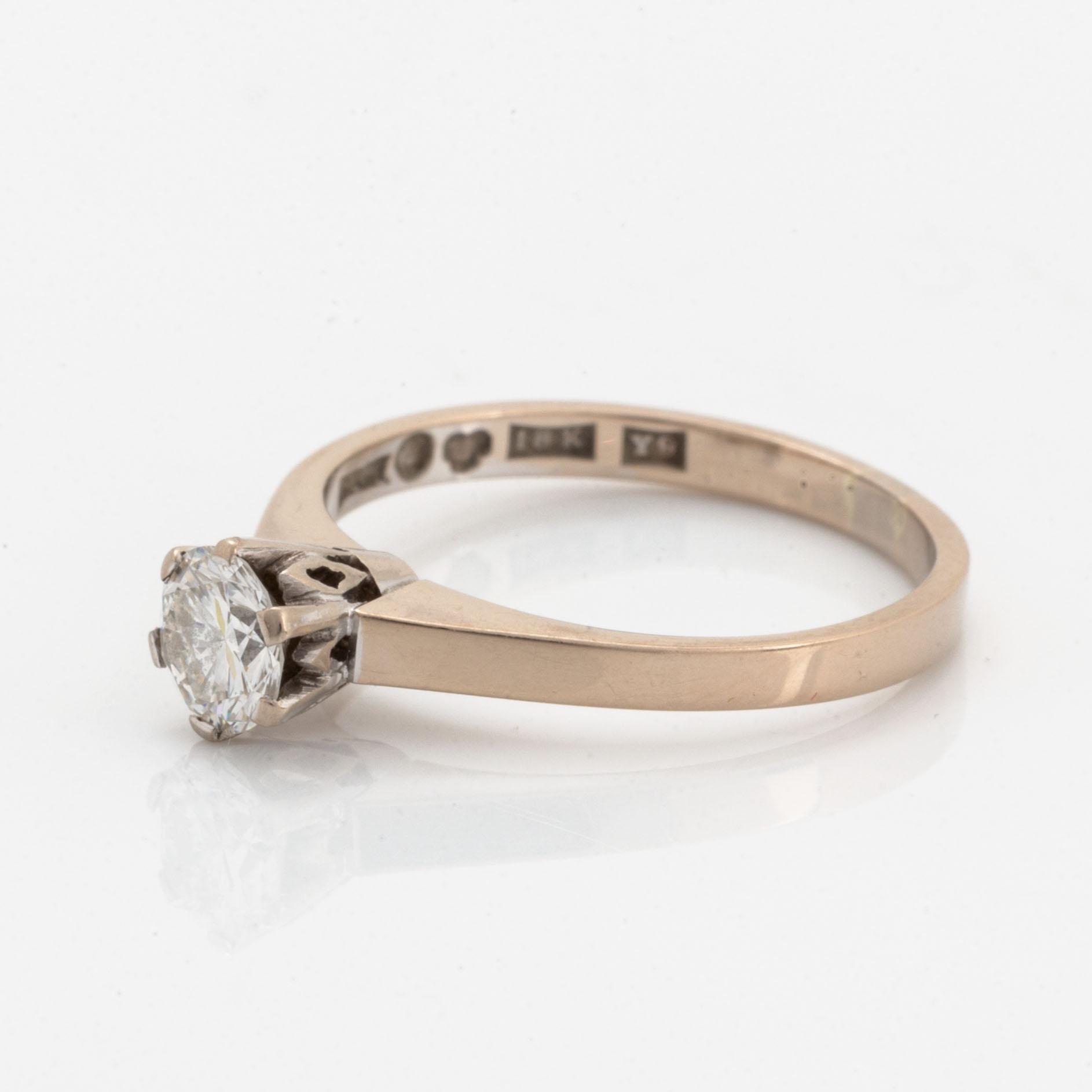 Brilliant-cut diamond solitaire ring.
