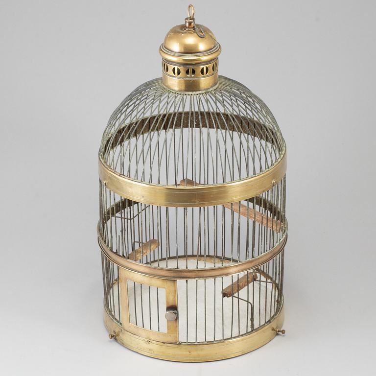 A 19th century brass bird cage.