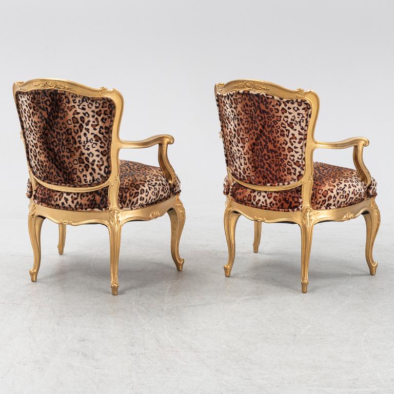 A pair of Louis XV style armchairs, 20th Century.