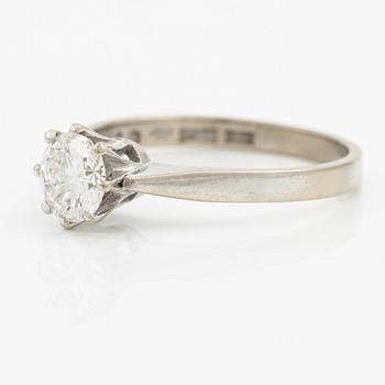 Ring in 18K white gold set with a brilliant-cut diamond weighing 0.84 ct according to the engraving.