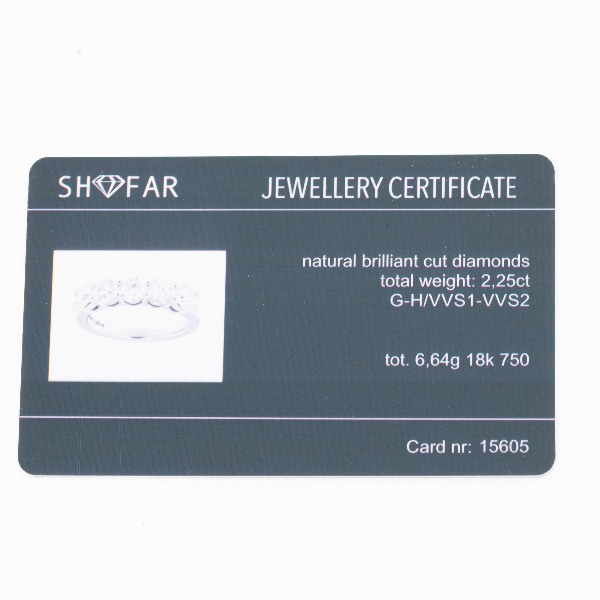 18K white gold half eternity ring with brilliant-cut diamonds.