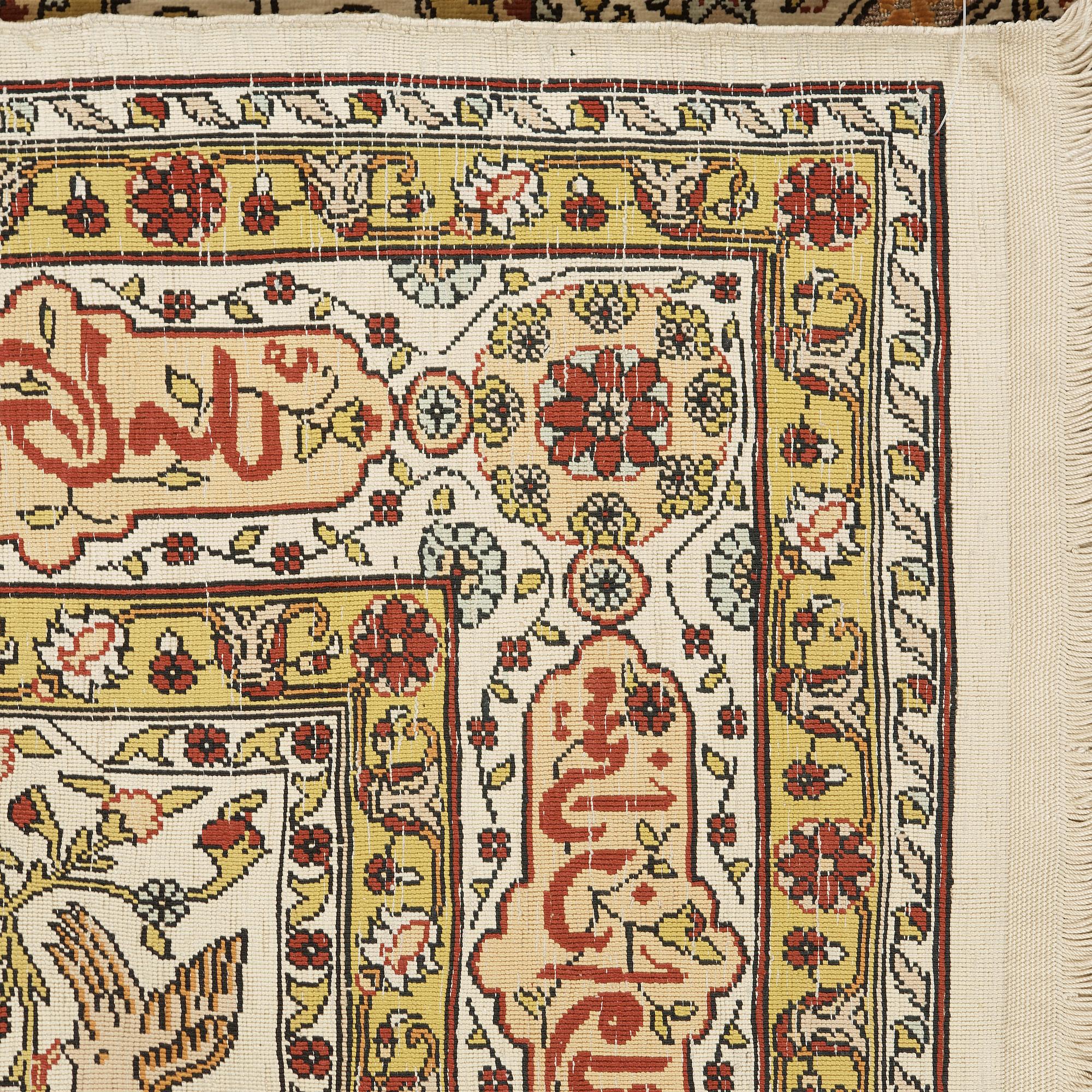 A silk Hereke possibly, around 96 x 66 cm.