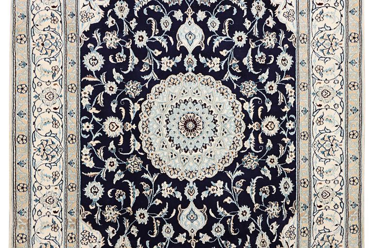 A part silk Nain rug, 9LA, c. 292 x 190 cm.