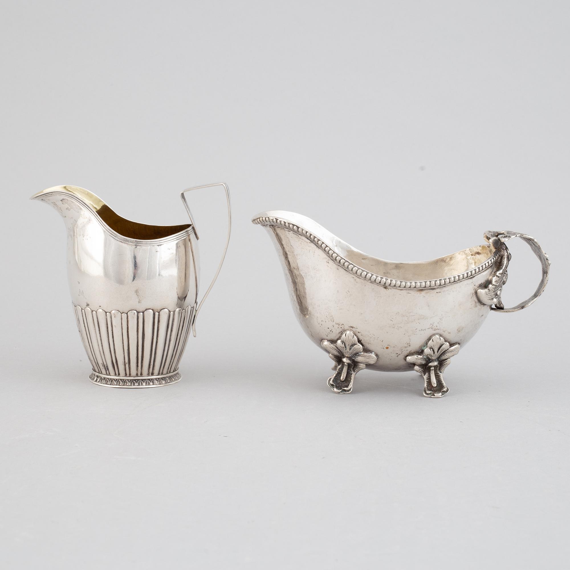 Two creamers, silver, one german and one Johan Petter Grönvall, Stockholm 1827.