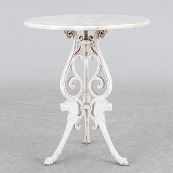 a late 20th century cast iron garden table.