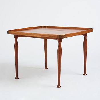 Josef Frank, a model 1074 coffee table for Firma Svenskt Tenn, Stockholm, Sweden.