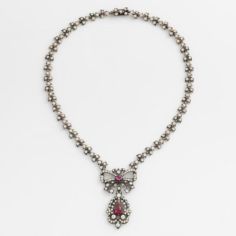 Set of necklace and earrings, silver and paste.