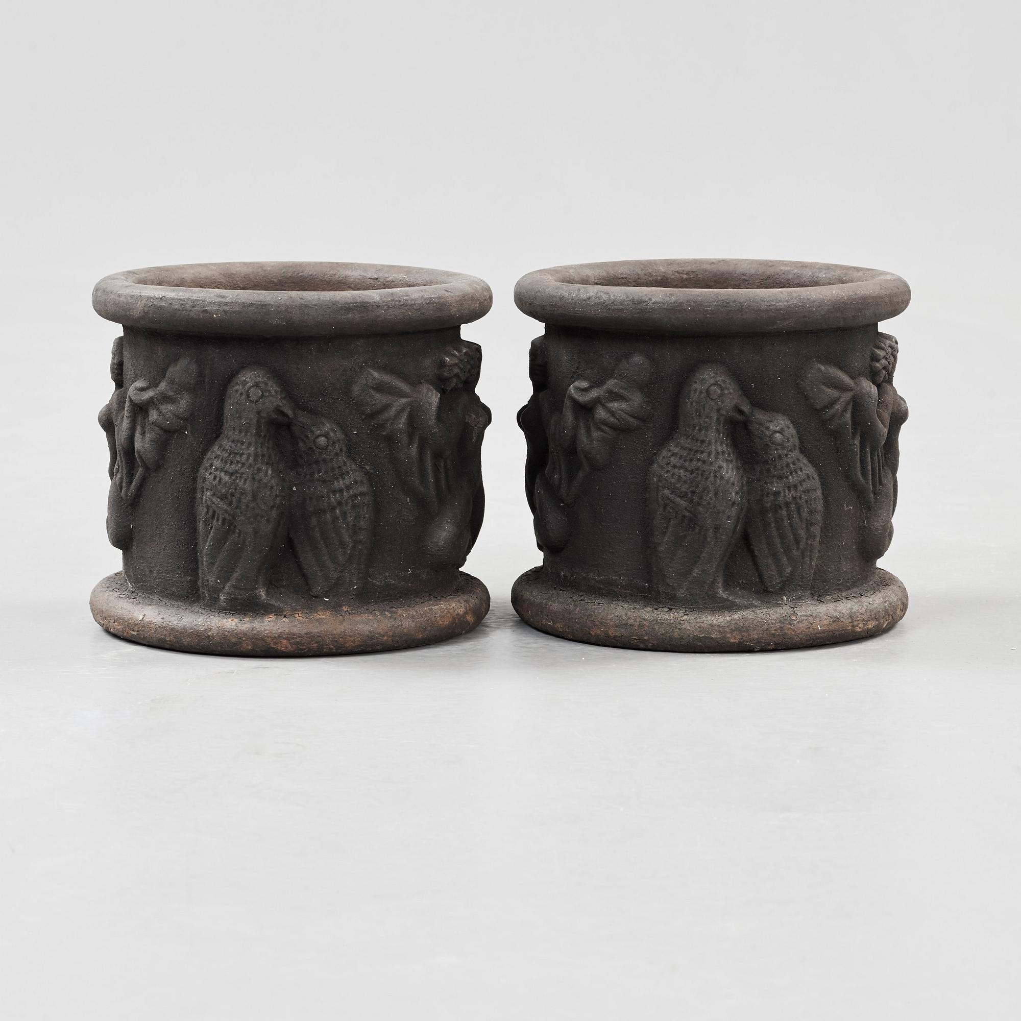 A pair of Anna Petrus cast iron jardinières, Näfveqvarn, Sweden.