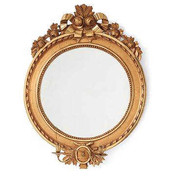 71. A Gustavian two-light girandole mirror.