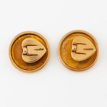 A pair of cufflinks 14K gold with monogram.