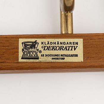 Klädhängare, "Dekorativ", Skogslunds Metallgjuteri, Anderstorp, 1950/60-tal.