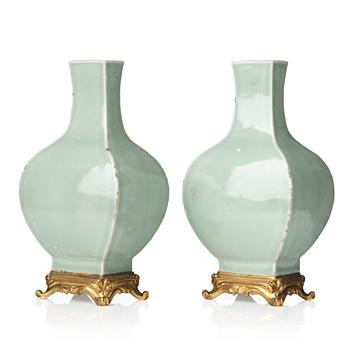 595. A pair of celadon vases with gilt bronze mounts, Qing dynasty, 18th Century.