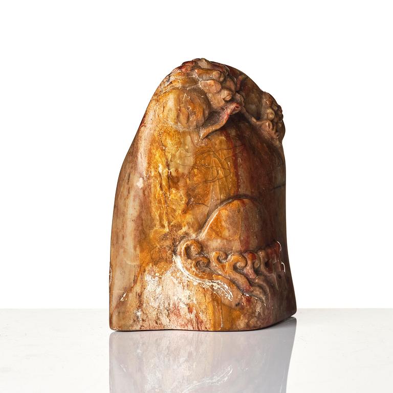 A group of carved nephrite and jade ornaments, China, Qing dynasty and older. (8 pieces).