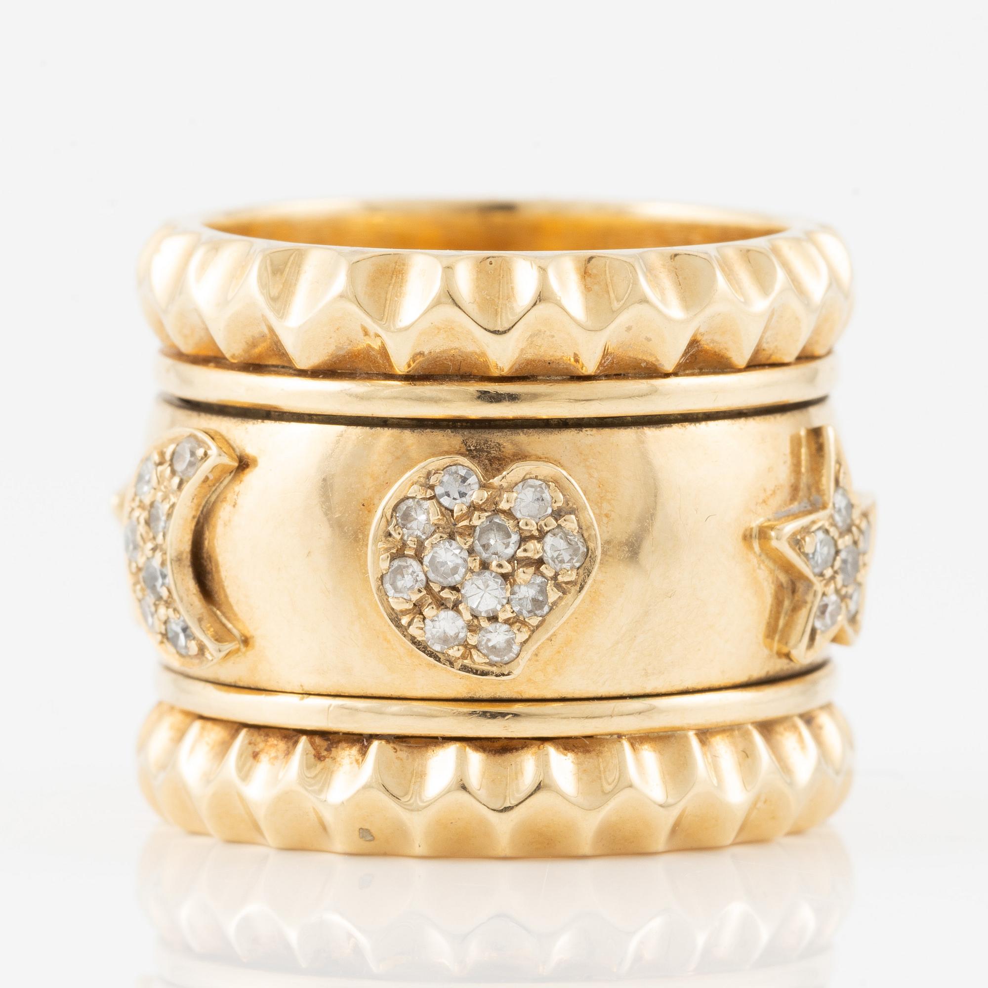 Ring in 18K gold with eight-cut diamonds, decorated with stars, hearts, and moons.