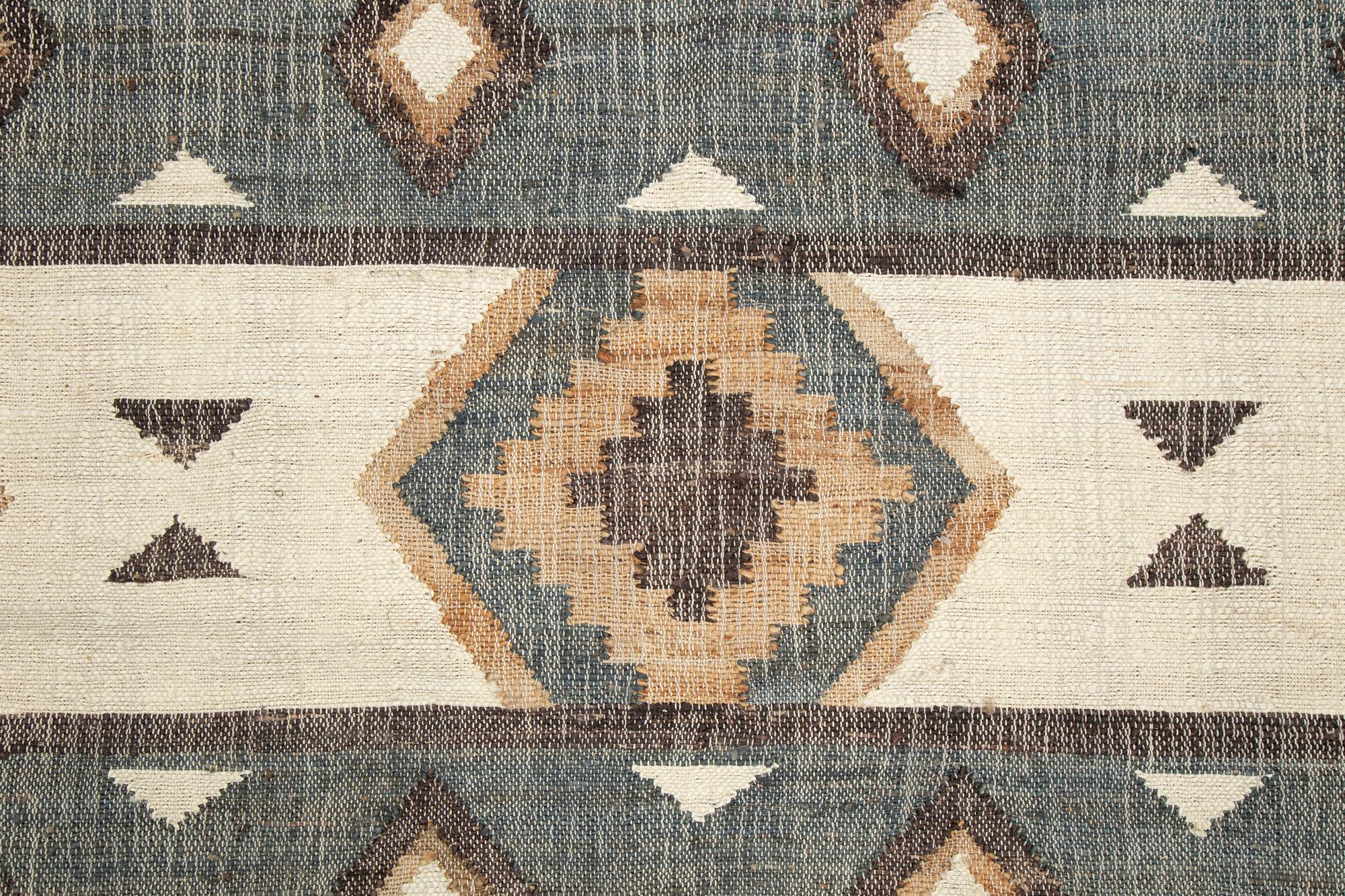 An Indian flat weave carpet,  approx. 287 x 174 cm.