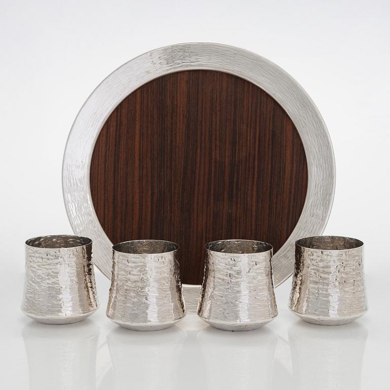 Tapio Wirkkala, four silver beakers, and a rosewood and sterling silver tray, Kultakeskus, Hämeenlinna 1973-74.