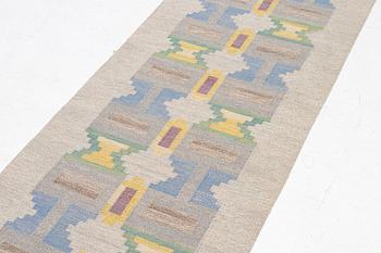Judith Johansson, a runner , 'Soldis', flat weave, c. 325 cm by 90 cm, signed JJ.