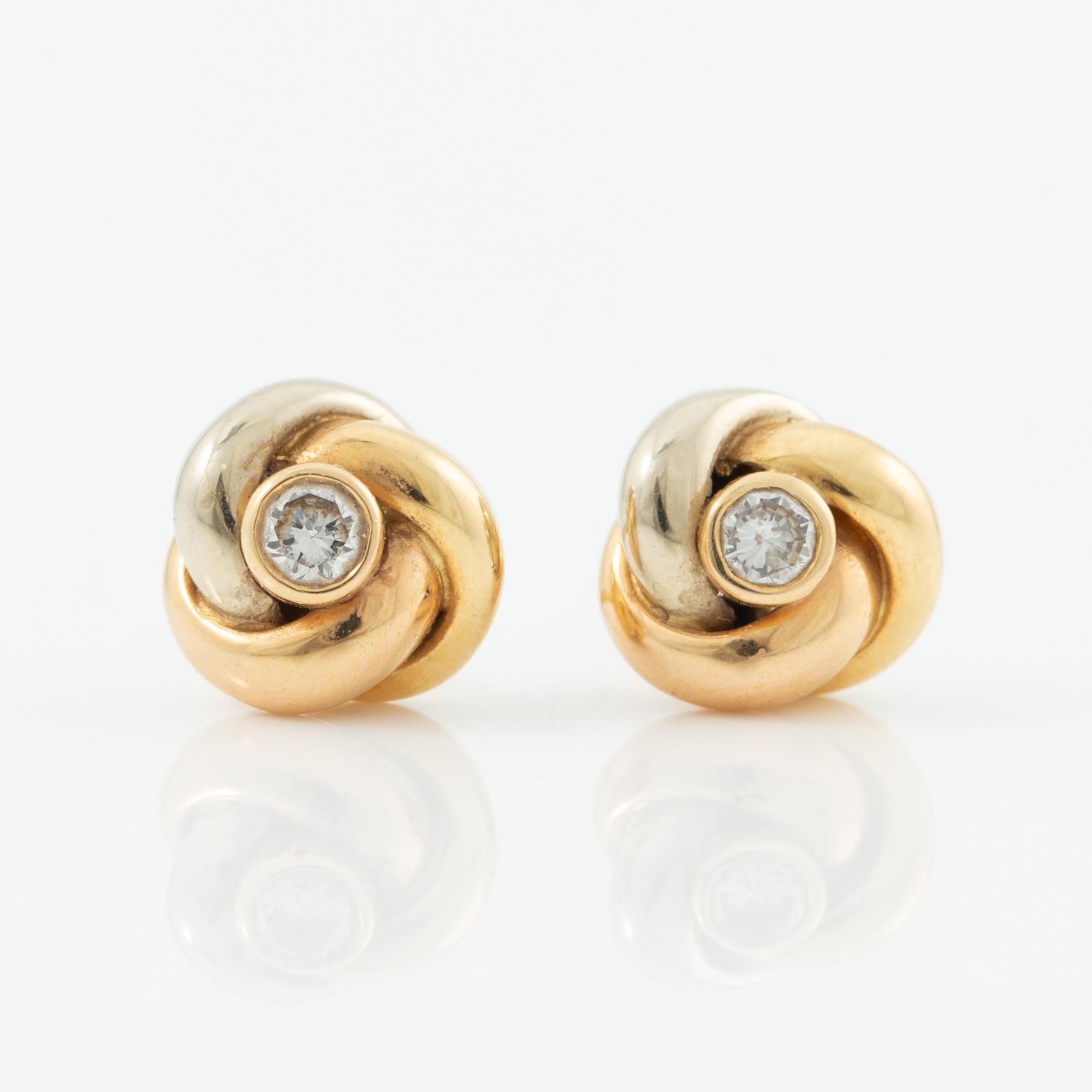 Cartier, earrings, a pair, "Trinity" 18K gold with round brilliant-cut diamonds.