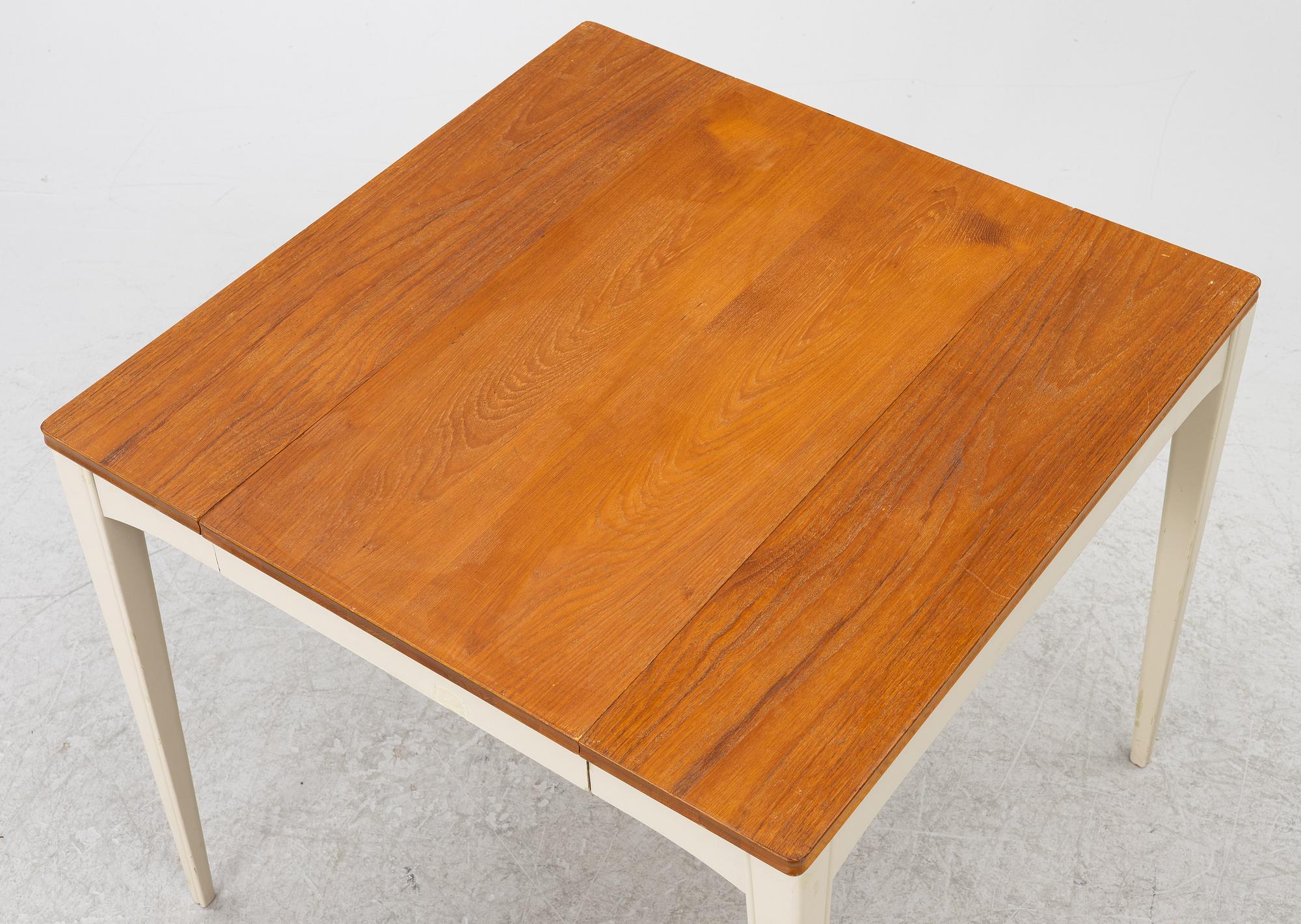 A dining table, mid-20th century.